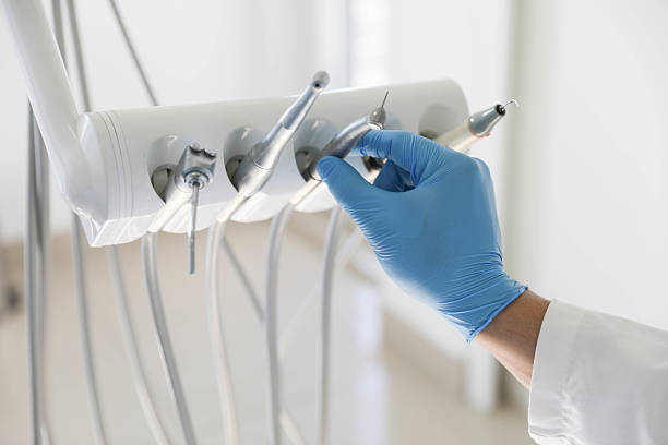 Professional Tooth Extraction technician working in Schoolcraft, MI